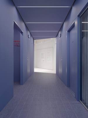 SMALE AKSENTER: Den lavendelblå korridoren er kledd med linoleumgulv. Med sveisetråd i avvikende farger er det skapt en spennende aksent. <br />Foto: Tarkett