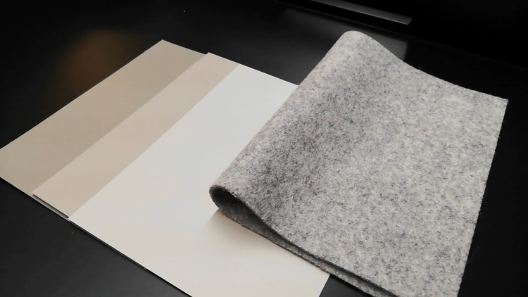 Collage med lyse nøytrale farger og grå tekstiler