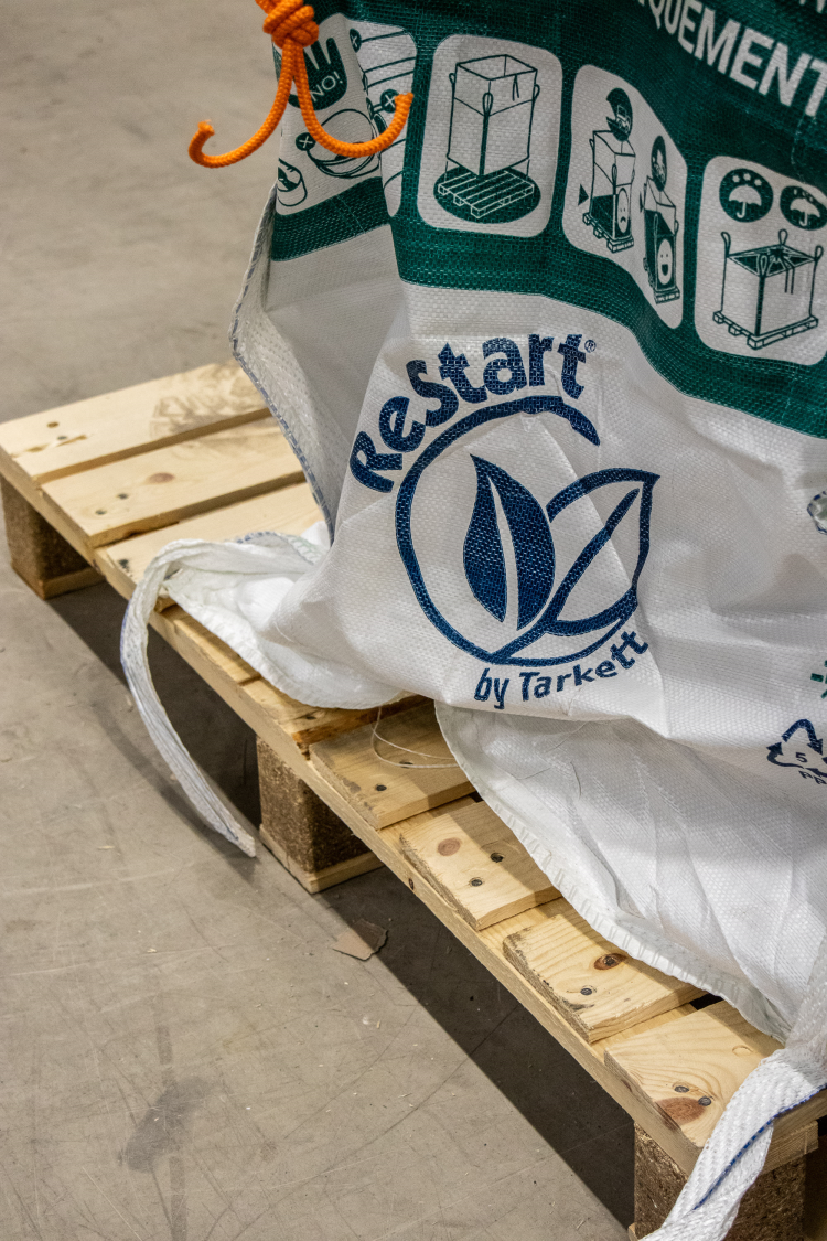 ReStart-merke trykket på en storsekk som står på en lastepall