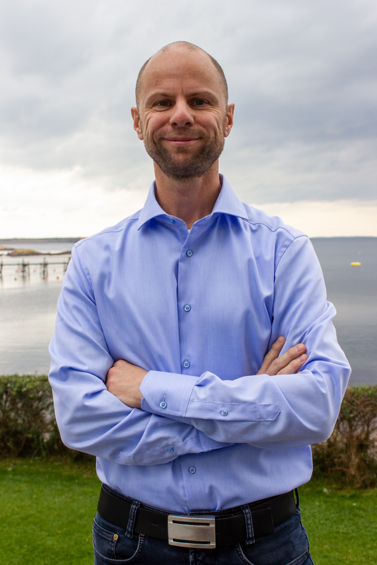 Stian Wiulsrud, mann i blå skjorte