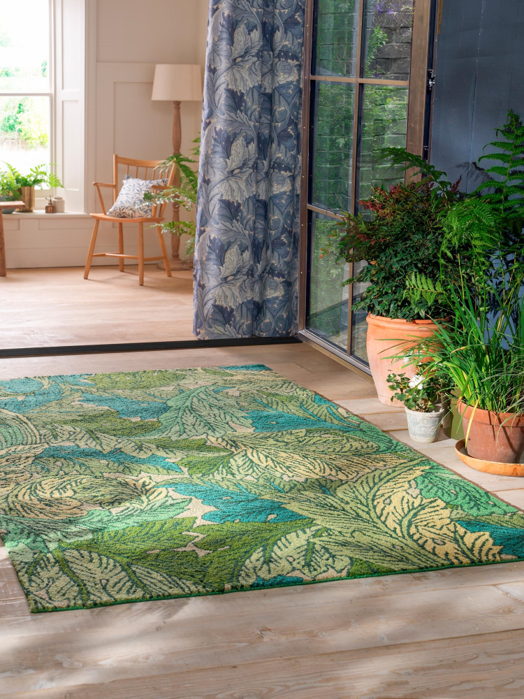 tykt grønt teppe med Morris-mønster 